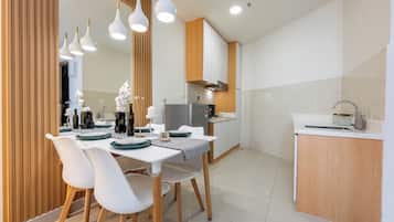 Suite « Premier », 1 chambre, vue mer | Cuisine privée