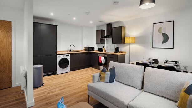 A modern apartment with a kitchen, dining area, and living room. - City Point Aberdeeen by Guestz (Aberdeen)