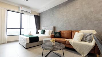 Deluxe Studio, 1 Queen Bed, Non Smoking | Living area | 43-inch Smart TV with digital channels