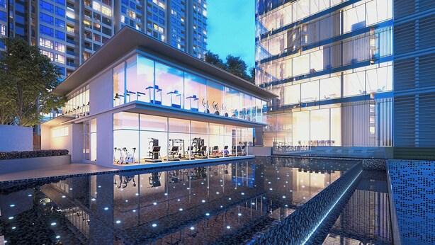 A modern building with a glass facade, outdoor exercise equipment, and a reflective pool. - Sunsuria Forum Premier Suites Setia Alam (Shah Alam)
