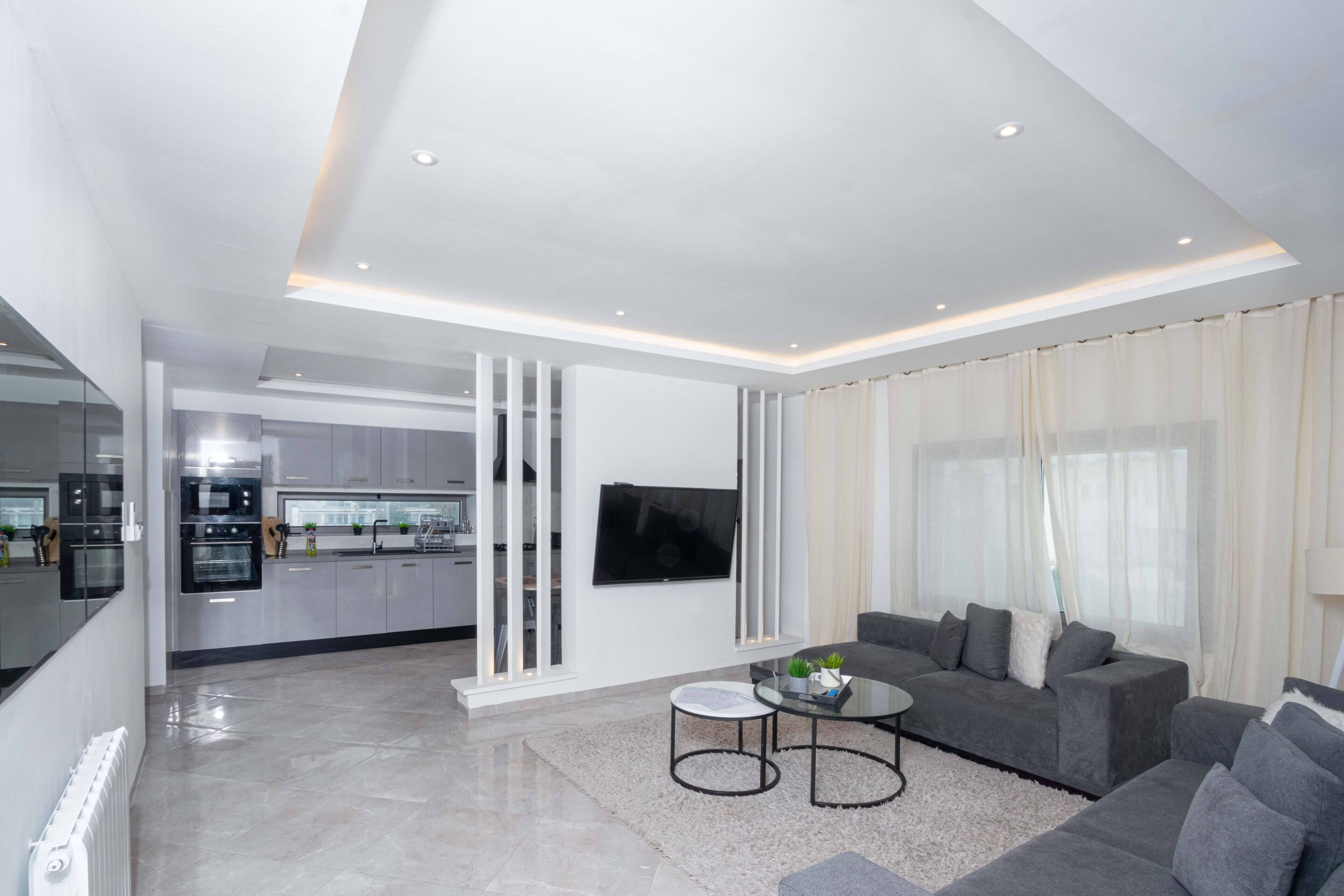 Attico Comfort, balcone, vista città | Area soggiorno