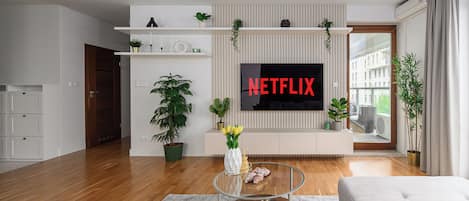 Comfort Apartment, Balcony, City View | Living area | 40-inch Smart TV with digital channels, Netflix, streaming services