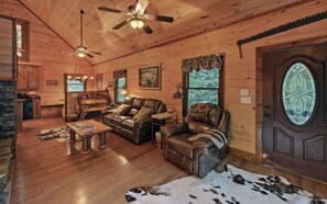 TV, fireplace, DVD player - A River Runs Through It by Chatuge Home Concierge | Private Riverfront · Rustic Luxury Cabin · Fireplace · Deck Views · Kayak & Fish Access (Hayesville)