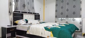 Deluxe Room - REAL P&D HOTEL AND SUITES  (Ifon)