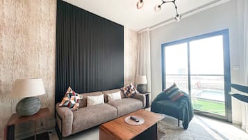 Standard Apartment, Balcony | Living area | 42-inch Smart TV with satellite channels, Netflix, streaming services