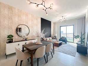 Standard Apartment, Balcony | Living area | 42-inch Smart TV with satellite channels, Netflix, streaming services - Stunning 1BR Luxury Apt with Pool View (Dubai)