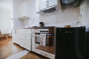 Habitación cuádruple estándar | Cocina privada