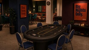 A craps table with chairs, a dartboard, and a sign that reads 'Big Nights Only.' - Besto Residence Kino-billard-poker-kicker (Albstadt)