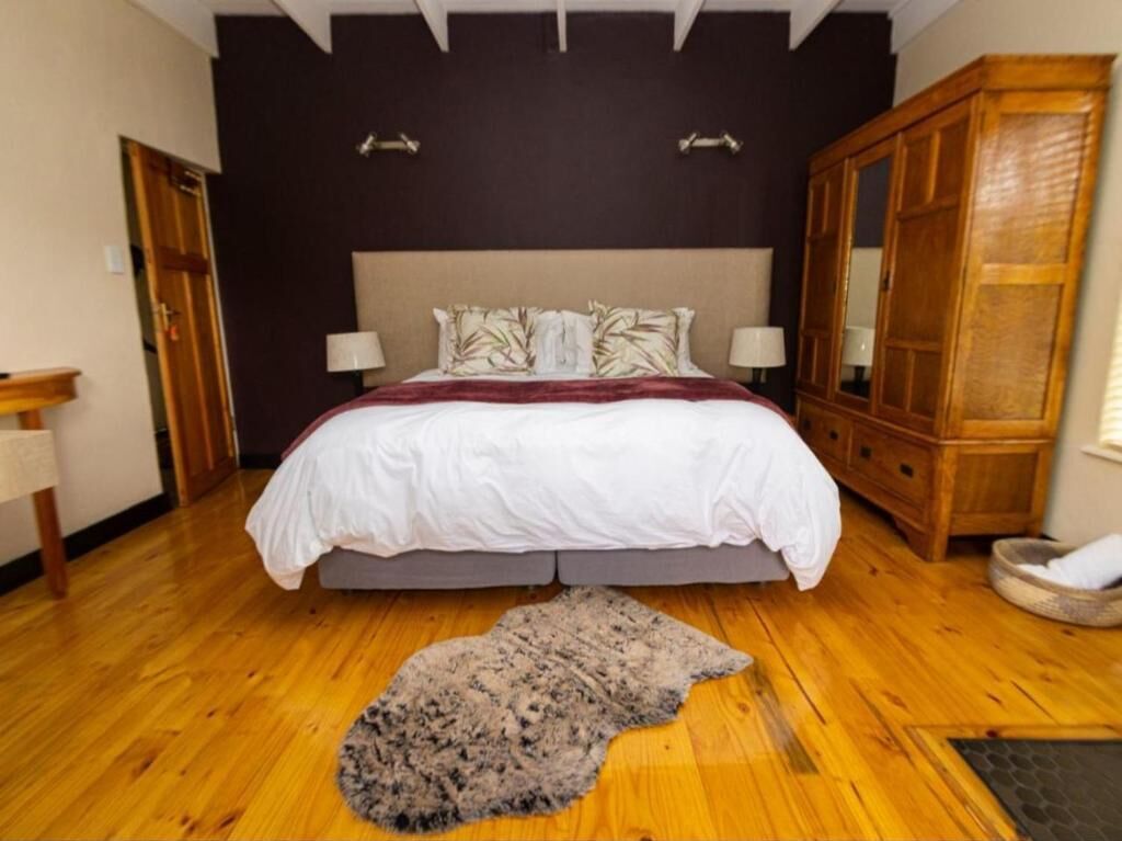 Chambre Confort double ou avec lits jumeaux | Fer et planche à repasser, accès au Wi-Fi (inclus)