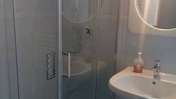 Shower, bidet, towels, soap