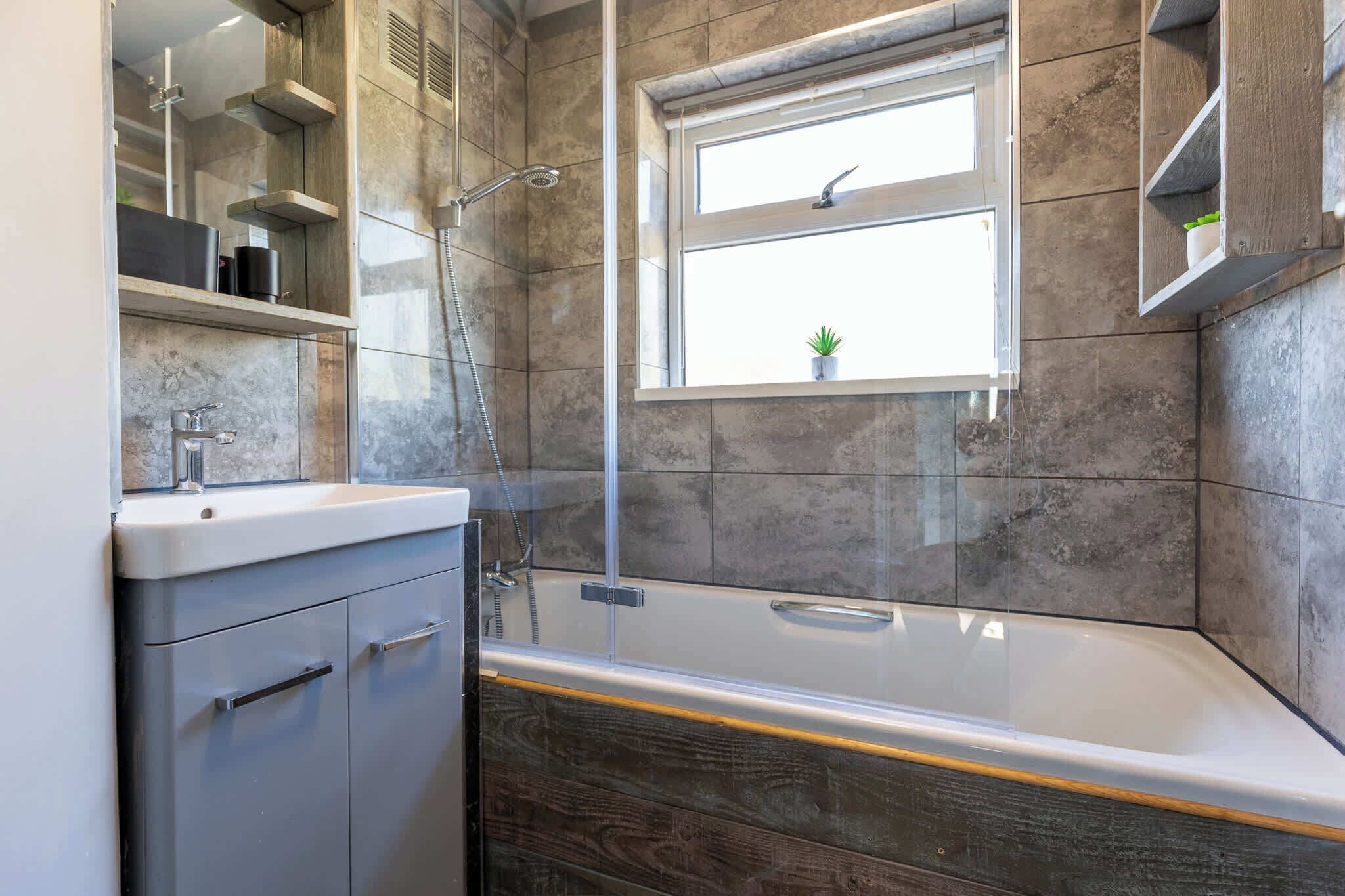 Shower, hair dryer, towels, shampoo