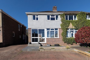 Exterior - Family Home with Garden Room & Woodland Views (Kennington)