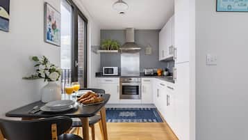 City Apartment, 1 Double Bed with Sofa bed, Non Smoking, City View | Private kitchen | Espresso maker, coffee/tea maker, electric kettle, high chair