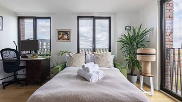 Apartamento urbano, 1 cama de casal e sofá-cama, para não fumantes, vista para a cidade | Ferros/tábuas de passar roupa, berços (sobretaxa), Wi-Fi de cortesia