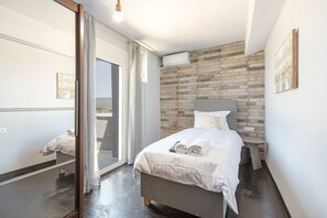 3 slaapkamers, een strijkplank/strijkijzer, wifi, beddengoed