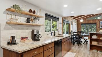 Coffee/tea maker, fridge, microwave, oven