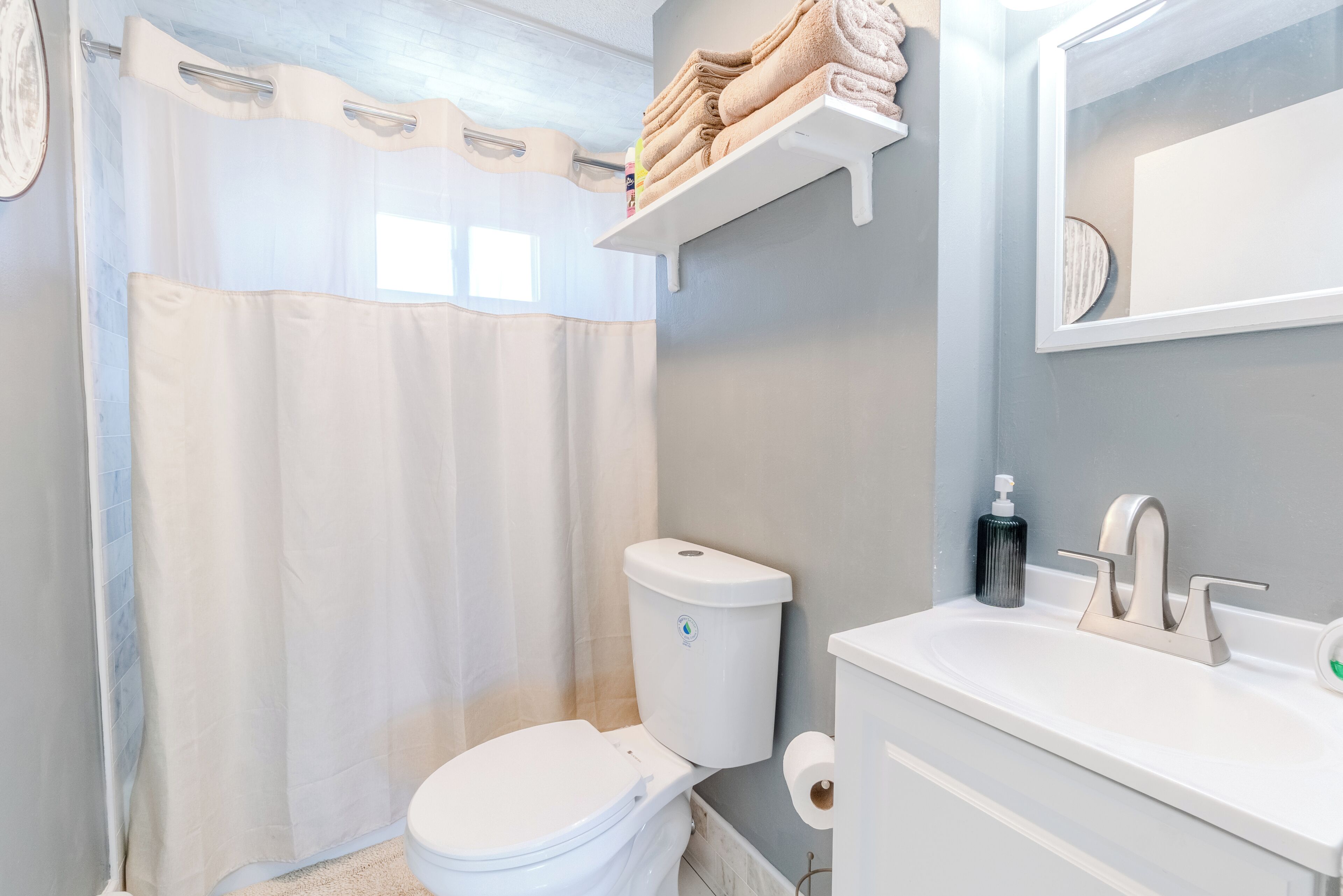 Hair dryer, towels, soap, toilet paper