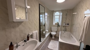 Combined shower/tub, deep soaking tub