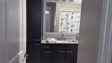 Hair dryer, towels, soap, toilet paper