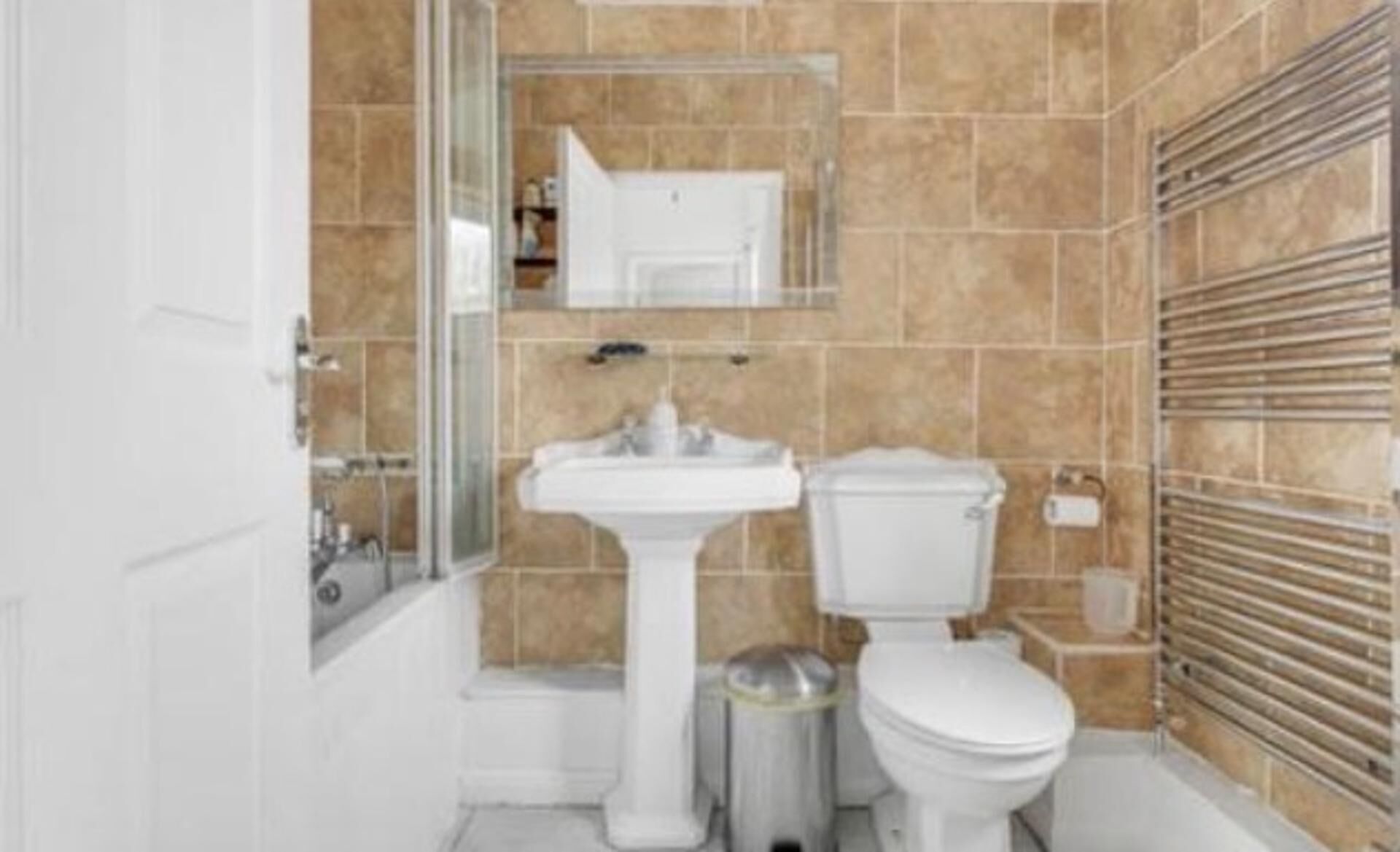 Combined shower/bathtub, deep-soaking bathtub, hair dryer, towels