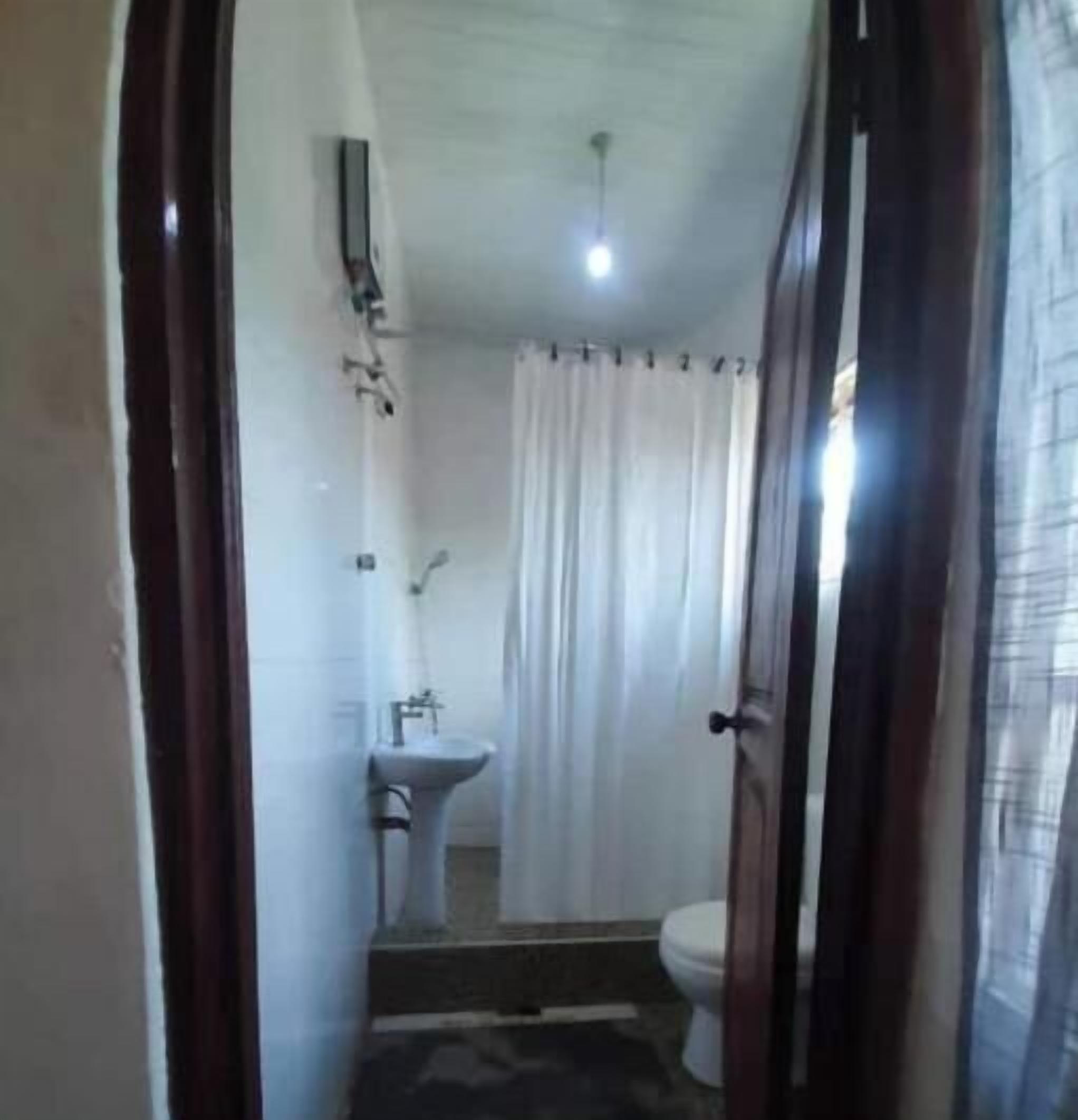 Shower, towels, soap, toilet paper