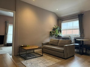 Suite, 1 Queen Bed | Living area