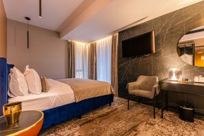 Deluxe-Dreibettzimmer, Balkon, Bergblick | Ausblick vom Zimmer