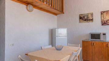 Departamento (Twin beds in mezzanine) | Área de sala de estar