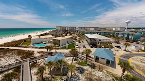 A coastal hotel with a pool, beach access, and a view of the ocean. - Seacrest 601b 2 Bedroom Condo (Fort Walton Beach)