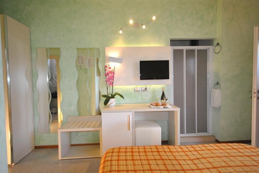 Quarto família, 2 quartos, terraço, vista para o mar | Cofres nos quartos, Wi-Fi de cortesia, acesso para cadeiras de rodas