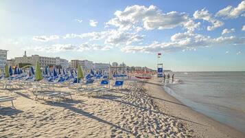 Private beach, white sand, sun-loungers, beach umbrellas