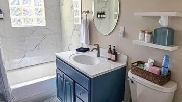 Hair dryer, towels, soap, shampoo