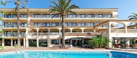 Seasonal outdoor pool, pool umbrellas, pool loungers