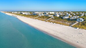 A coastal area with a beach, houses, and a clear view of the ocean. - The Poppy House + Seaside, Pet Friendly & Bikes (Santa Rosa Beach)