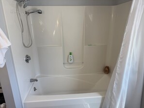 Shower, hair dryer, towels, toilet paper