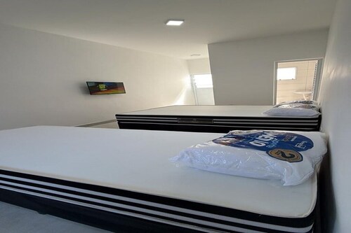 Studio apartment 5 minutes from Sesc beach in Bertioga-SP. Ideal for 3 people.