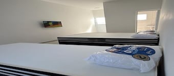 Studio apartment 5 minutes from Sesc beach in Bertioga-SP. Ideal for 3 people.