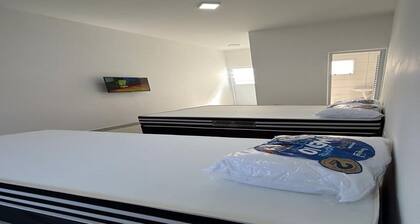 Studio apartment 5 minutes from Sesc beach in Bertioga-SP. Ideal for 3 people.