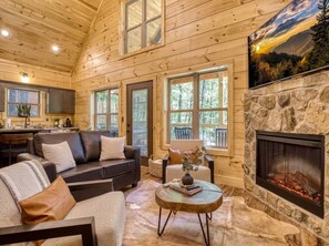 TV, fireplace - Twilight Escape | Designer Cabin + Firepit & Views (Sevierville)