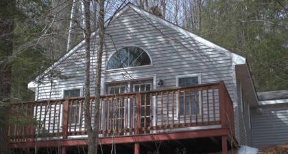 1 bedroom cottage with queen bed and 2 person whirlpool tub.