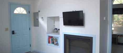 Televisión y chimenea