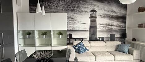 Deluxe Apartment | Living area | Flat-screen TV