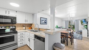 Fridge, microwave, stovetop, dishwasher - Sun, Sand & Comfort Await! Renovated 2BR Condo | Sleeps 6 | Steps to St. Augustine Beach (St. Augustine)