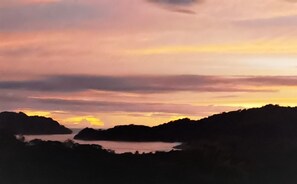 A coastal landscape with hills and a body of water. - Ocean View Boutique Retreat 4 with big Pool,BBQ,Blue Zone, Bioluminescence, Curu (Paquera)