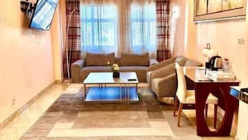 Superior Suite, City View | Living area