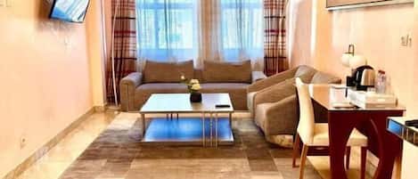 Superior Suite, City View | Living area