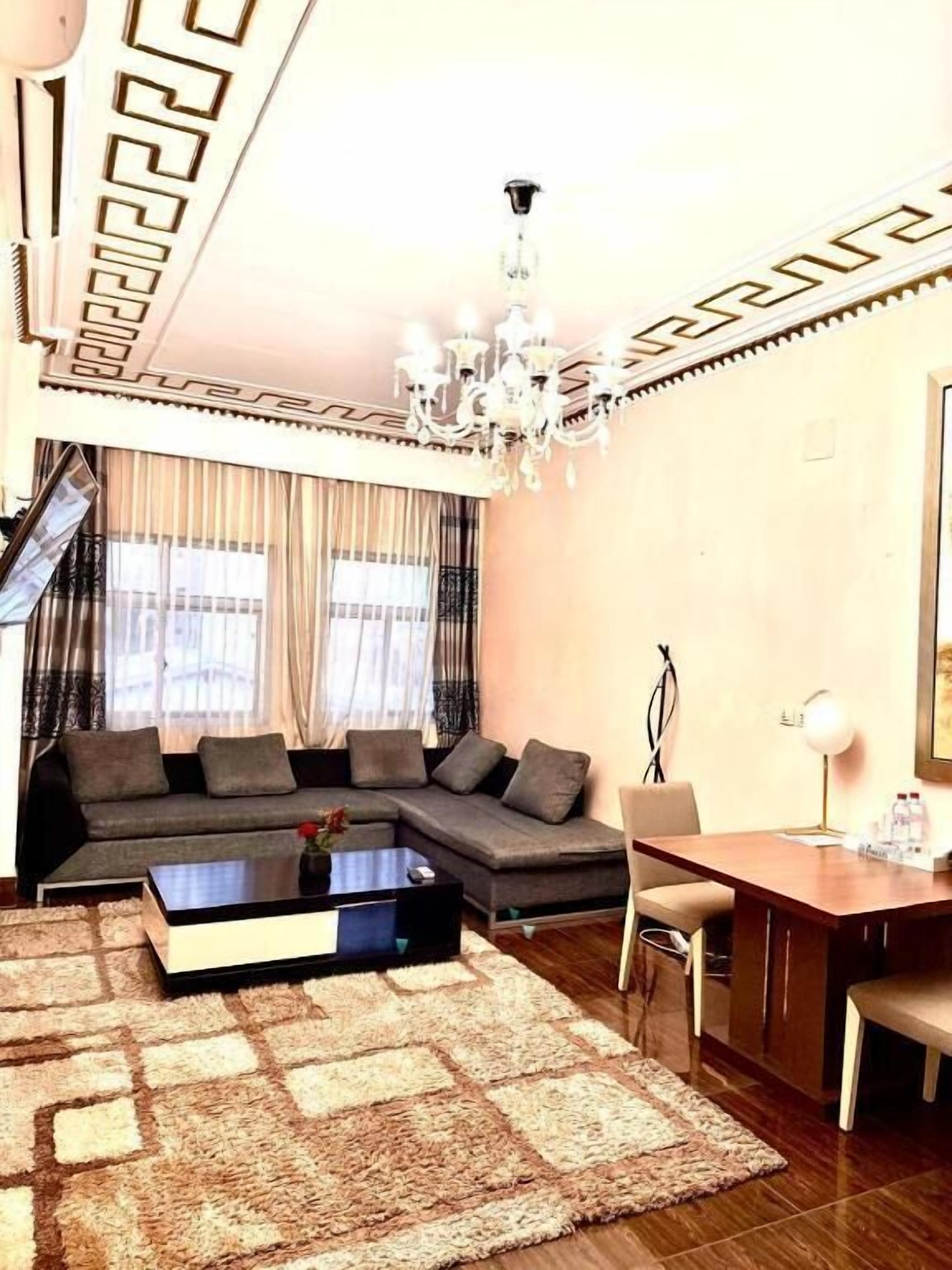 Superior Suite, City View | Living area