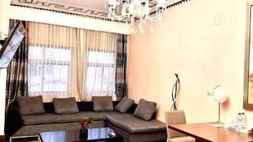 Superior Suite, City View | Living area