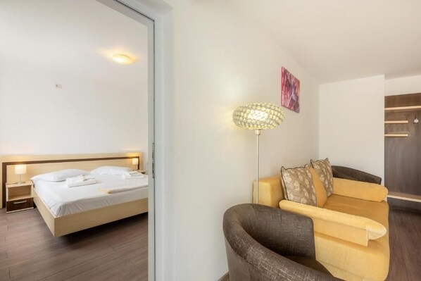 Family Apartment, Balcony, Partial Sea View | Iron/ironing board, free WiFi, wheelchair access