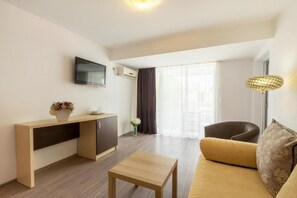Family Apartment, Balcony, Partial Sea View | Living area